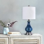 22″ Sapphire Blue Seeded Glass Accent Lamp ft. Curvy Gourd Design, Brushed Nickel Details, and Off-White Linen Drum Shade – Beautiful Contemporary Lighting for Any Room