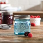 Aqua Vintage Regular Mouth Collector’s Edition Half Pint Canning Jars with Lids and Bands, 8-Ounces – (2 Pack) – Ball Regular Mouth Aqua Vintage 8 oz Mason Jars with Airtight Lids & Bands – For Decor, Canning, Fermenting, Pickling, Microwave & Dishwasher Safe + M.E.M Rubber Jar Opener Included